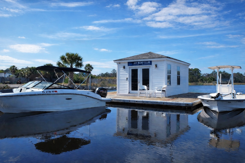 Jax Boat Club floating office and boats at Palm Cove Marina
